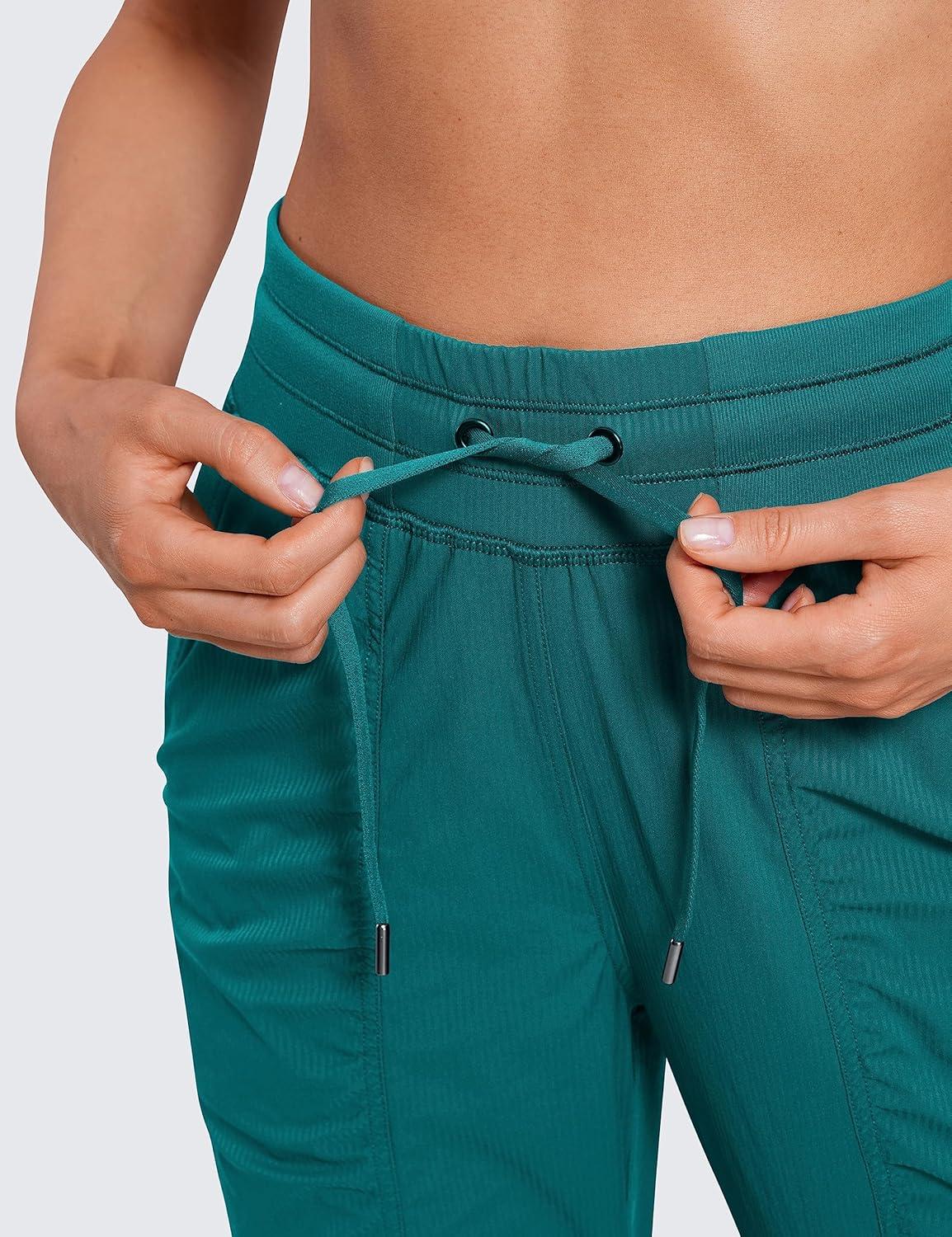 imageCRZ YOGA Lightweight Workout Joggers for Women 26quot285quot305quot Outdoor Running Casual Pants with PocketsGreen Jade