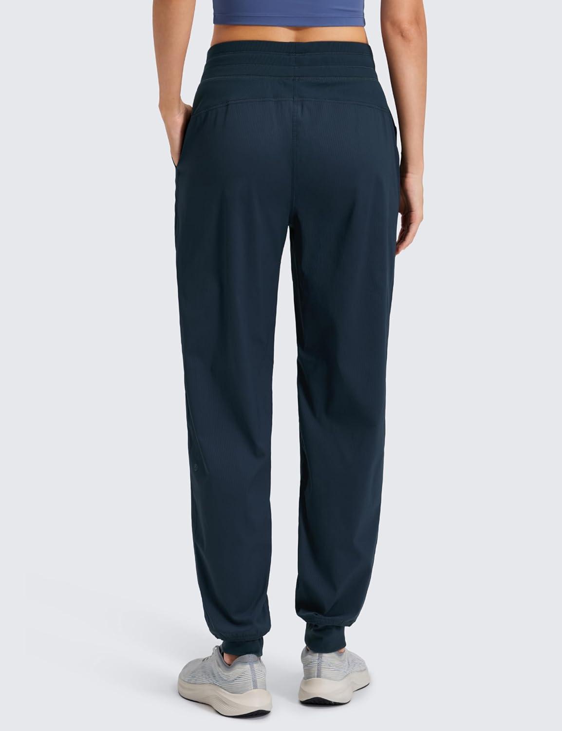 imageCRZ YOGA Lightweight Workout Joggers for Women 26quot285quot305quot Outdoor Running Casual Pants with PocketsInk Blue