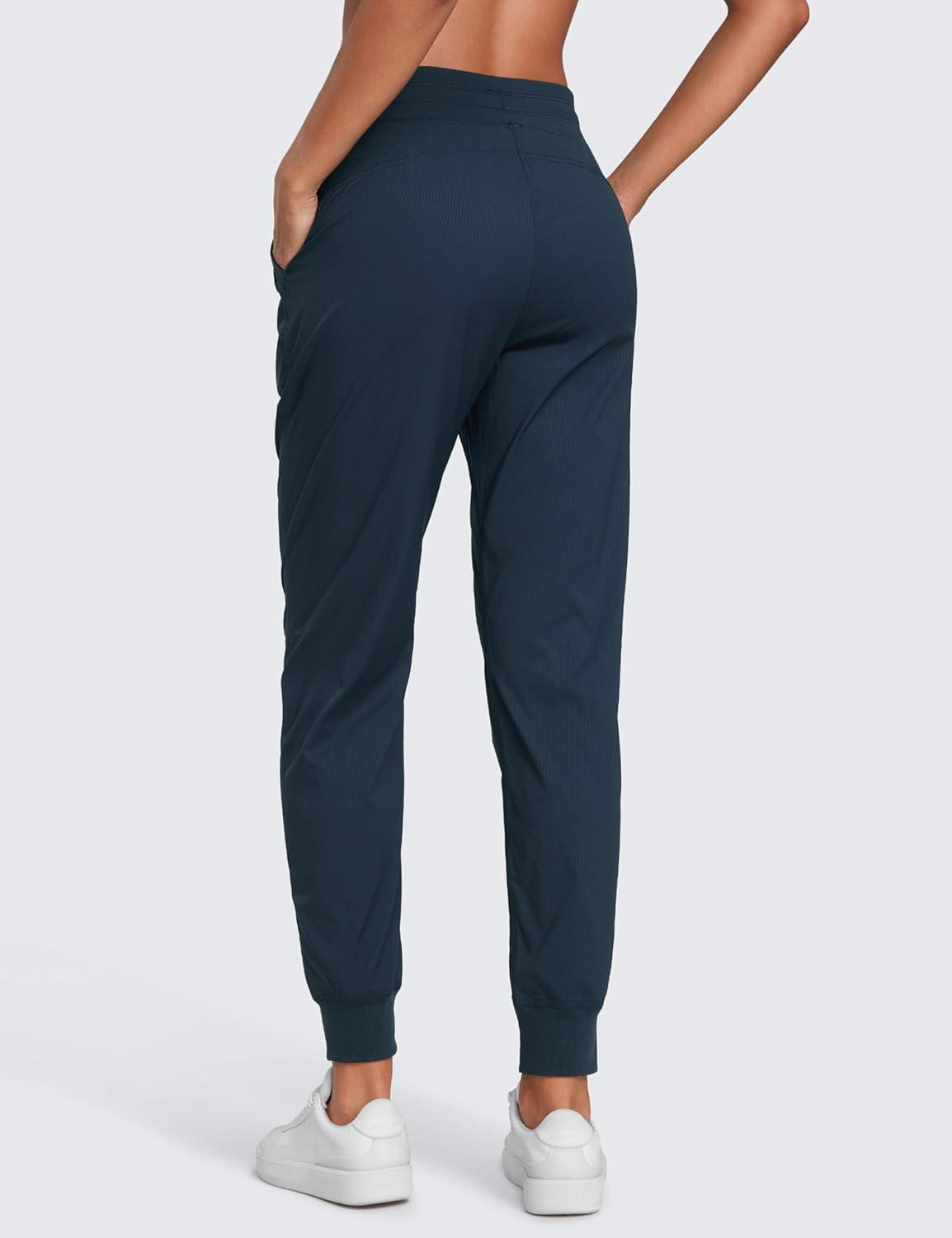 imageCRZ YOGA Lightweight Workout Joggers for Women 26quot285quot305quot Outdoor Running Casual Pants with PocketsInk Blue