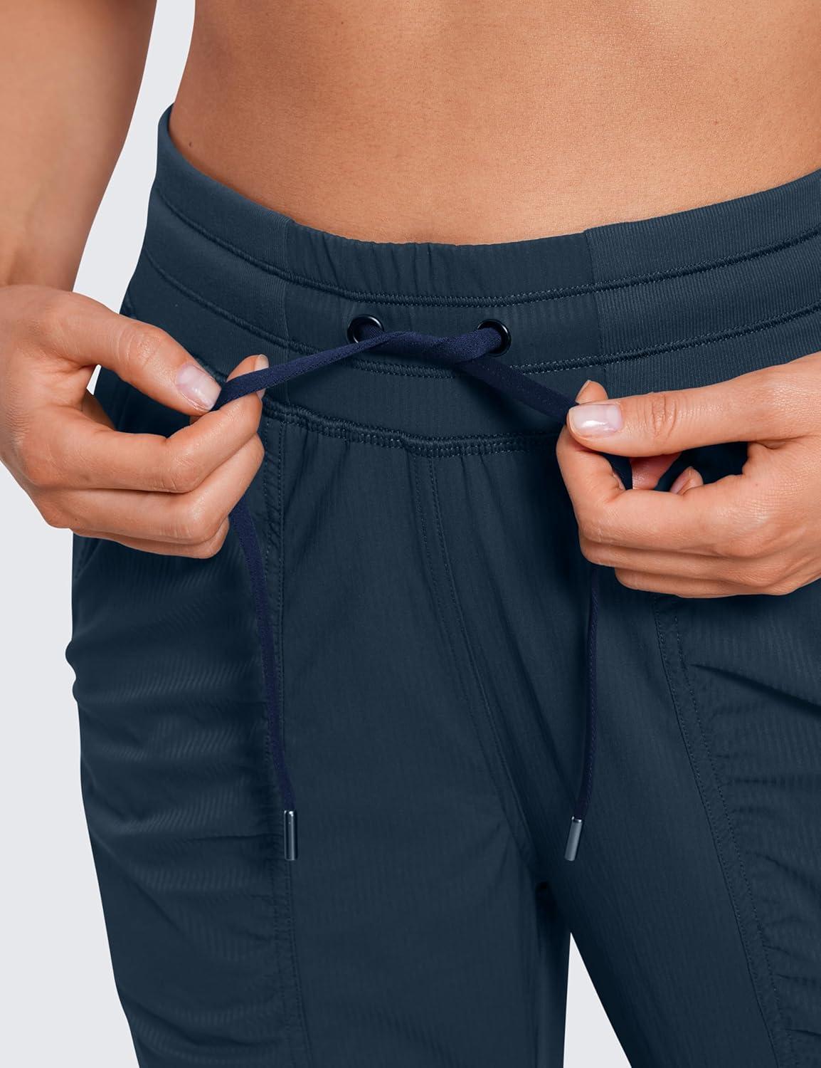 imageCRZ YOGA Lightweight Workout Joggers for Women 26quot285quot305quot Outdoor Running Casual Pants with PocketsInk Blue