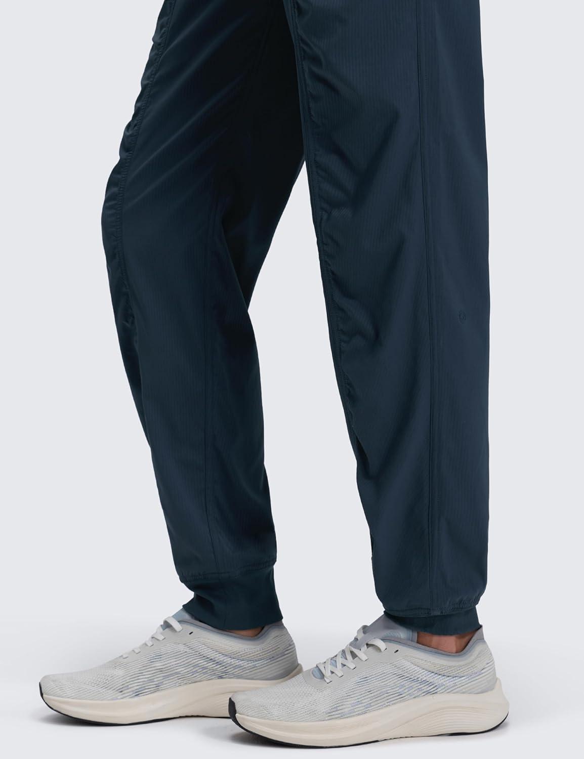 imageCRZ YOGA Lightweight Workout Joggers for Women 26quot285quot305quot Outdoor Running Casual Pants with PocketsInk Blue