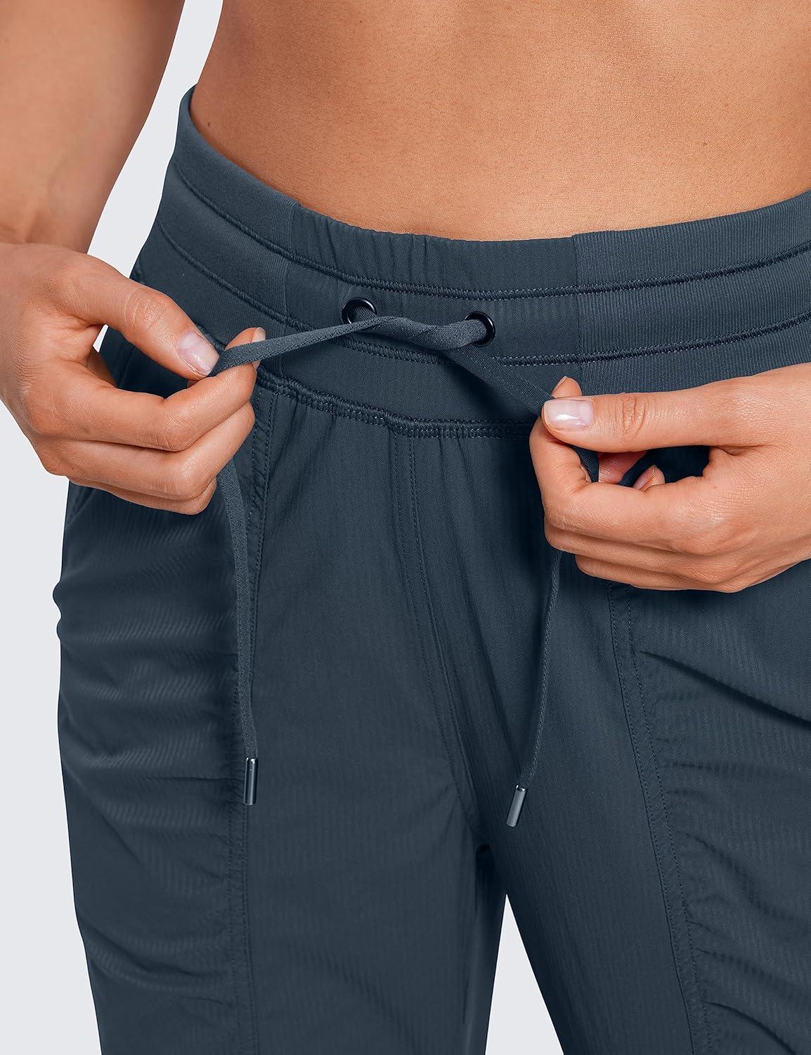 imageCRZ YOGA Lightweight Workout Joggers for Women 26quot285quot305quot Outdoor Running Casual Pants with PocketsMelanite