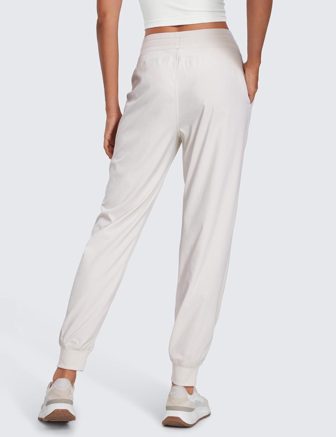 imageCRZ YOGA Lightweight Workout Joggers for Women 26quot285quot305quot Outdoor Running Casual Pants with PocketsMilky White Bone