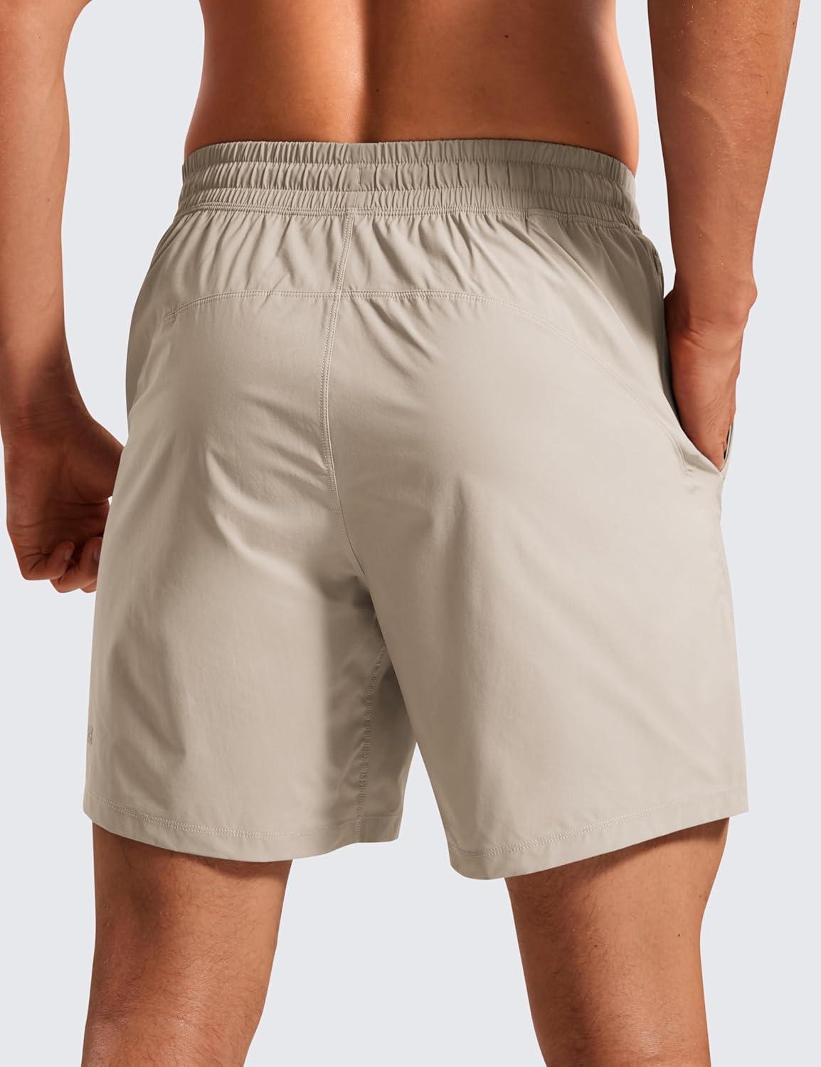 imageCRZ YOGA Mens Lightweight Workout Shorts 7quot Quick Dry for Gym Athletic Workout with Zipper PocketMojave Tan