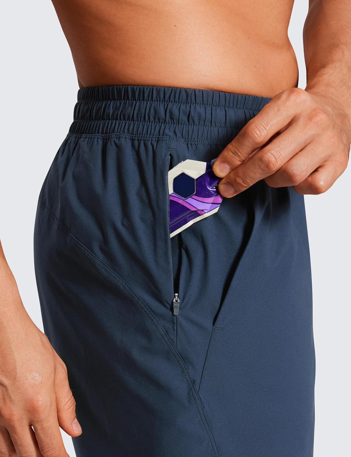imageCRZ YOGA Mens Lightweight Workout Shorts 7quot Quick Dry for Gym Athletic Workout with Zipper PocketStelindigo