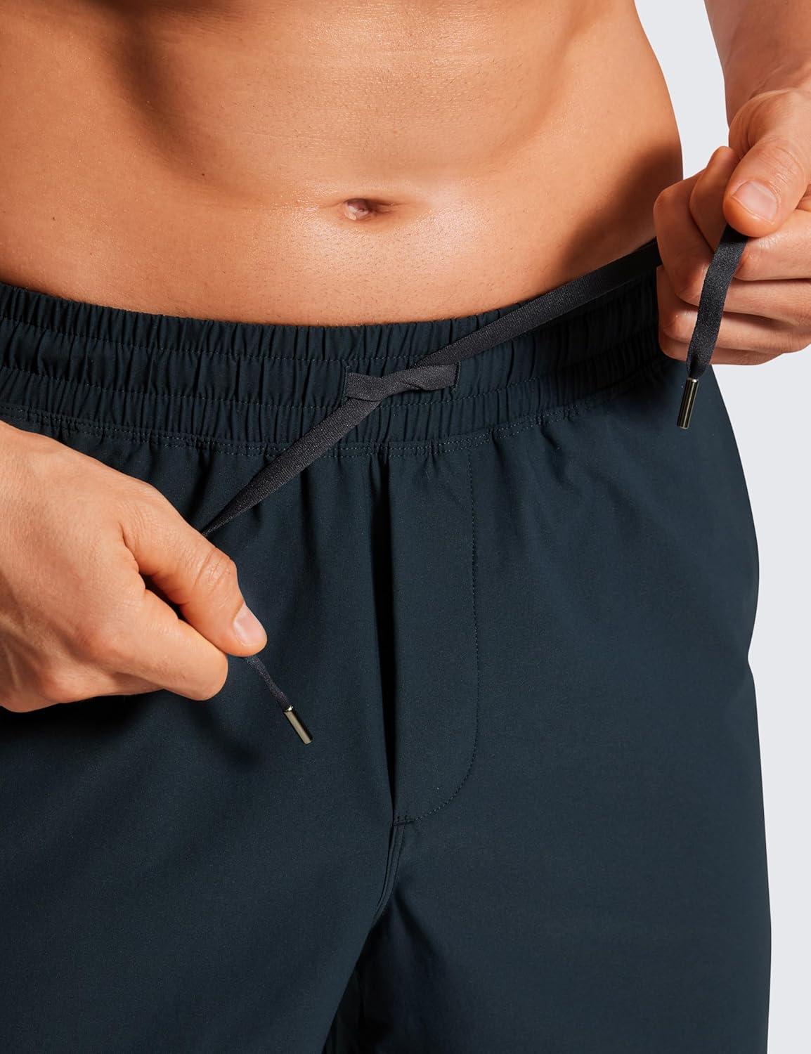 imageCRZ YOGA Mens Lightweight Workout Shorts 7quot Quick Dry for Gym Athletic Workout with Zipper PocketTrue Navy