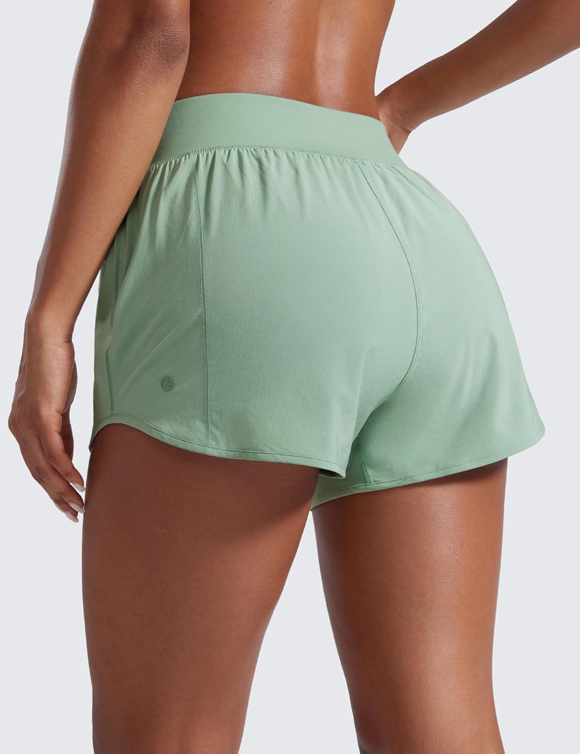 imageCRZ YOGA Mid Flat Waisted Running Shorts for Women 3quot Mesh Liner Quick Dry for Workout Sport Athletic with Zipper PocketGreen Palm Court