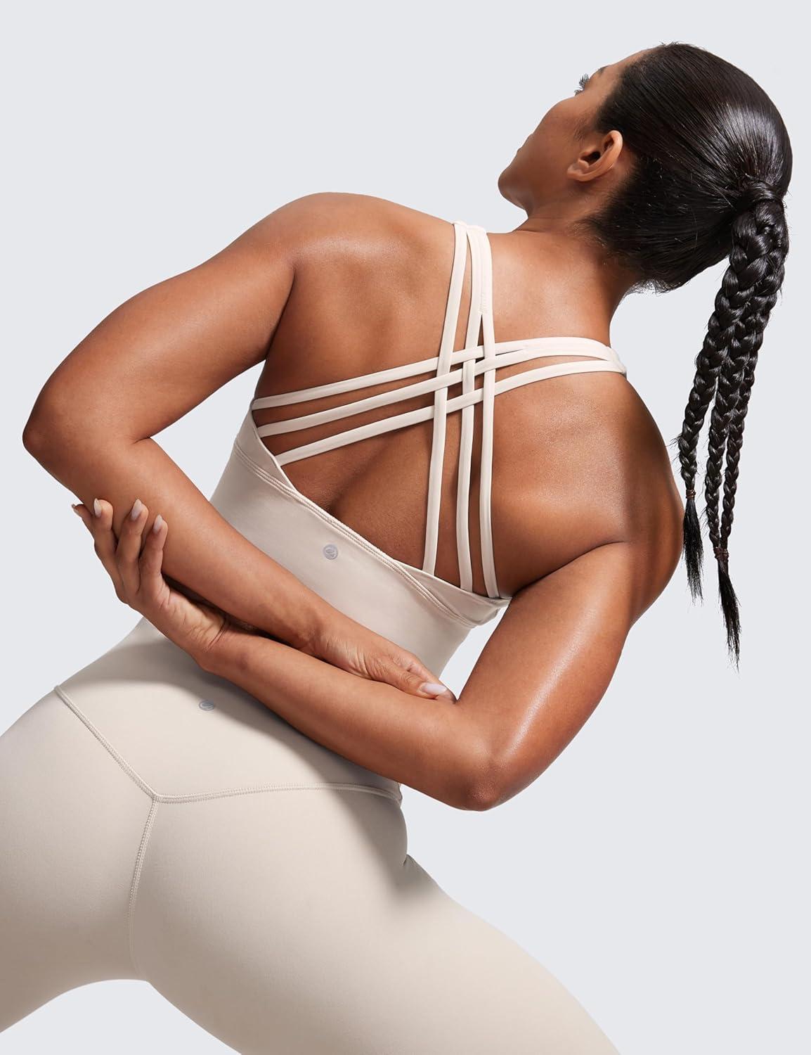 imageCRZ YOGA Naked Feeling Criss Cross Longline Sports Bras for Women Wirefree Padded Strappy Yoga Cropped TopsMojave Tan