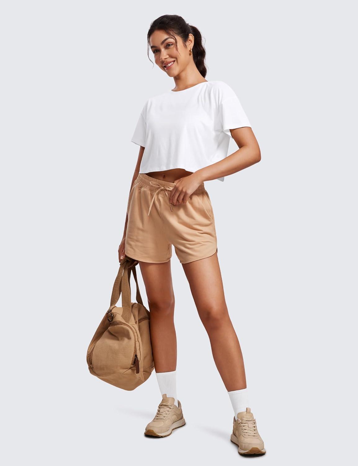 imageCRZ YOGA Open Back Short Sleeve Crop Top for Women Loose Athletic Yoga Workout Shirts Casual Cropped TShirtsWhite