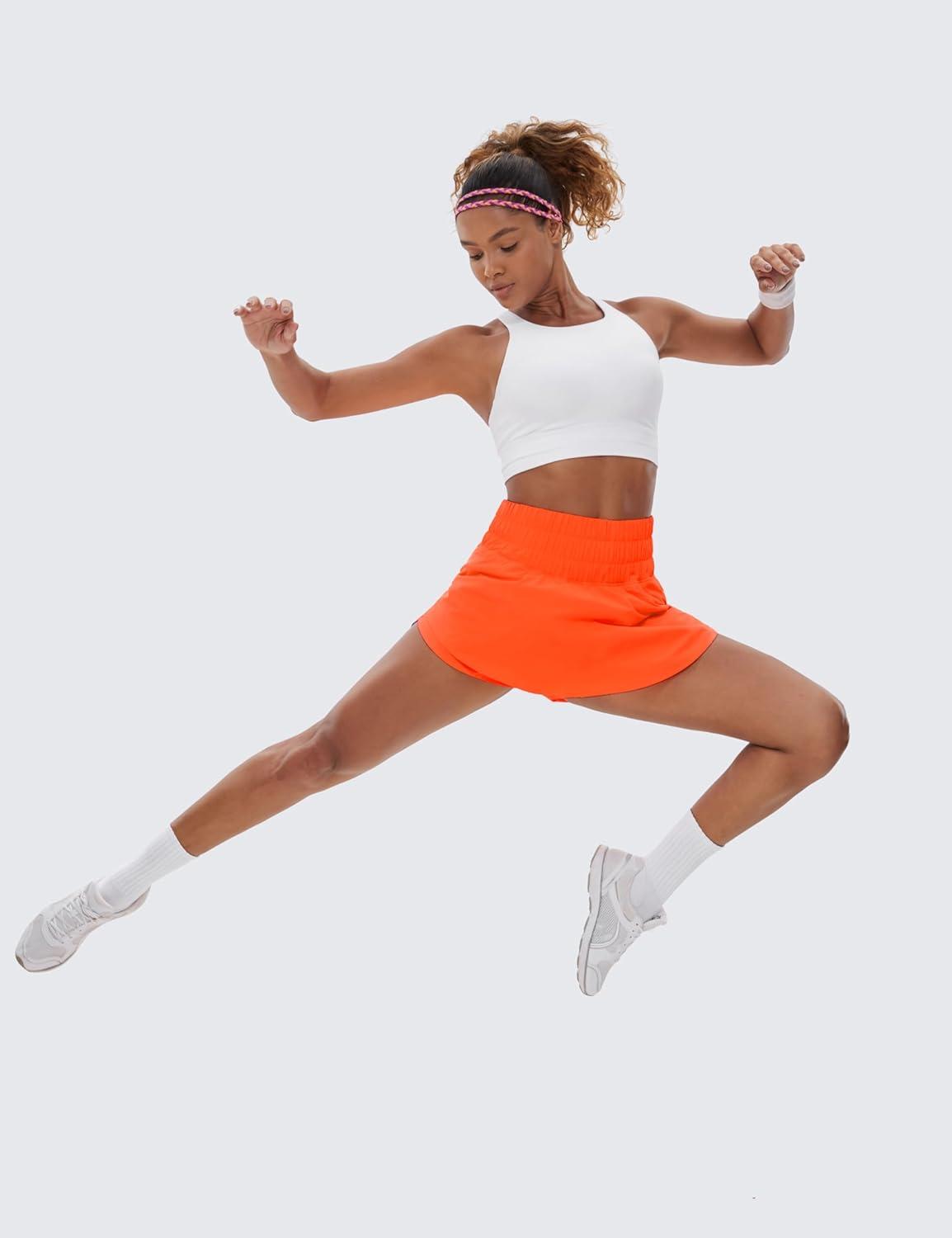 imageCRZ YOGA Ruffle Skirt Overlay Athletic Shorts for Women High Waisted Flowy for Workout Running Tennis with Zip PocketNeon Orange