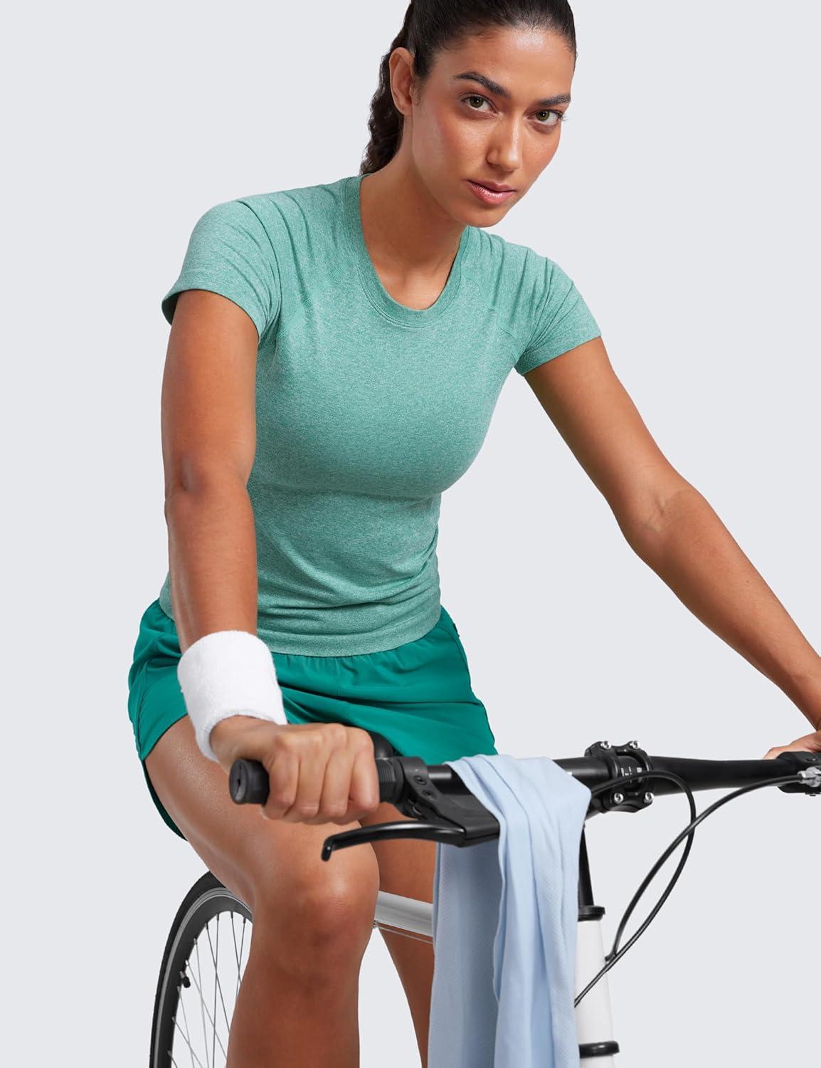imageCRZ YOGA Seamless Workout Tops for Women Waist Running Gym Athletic Yoga Short Sleeve Shirts Breathable Basic CrewneckCascadia Green Heather