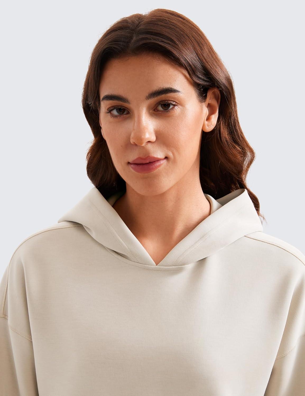 imageCRZ YOGA SoftAura Cropped Hoodies for Women Long Sleeve Pullover Basic Workout Casual Hooded SweatshirtsMojave Tan