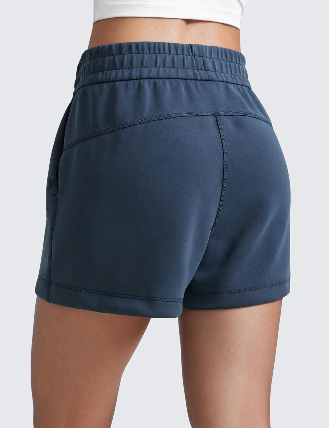 imageCRZ YOGA SoftAura Sweat Shorts for Women 4quot High Waisted Modal for Casual Lounge Athletic with Pockets DrawstringInk Blue