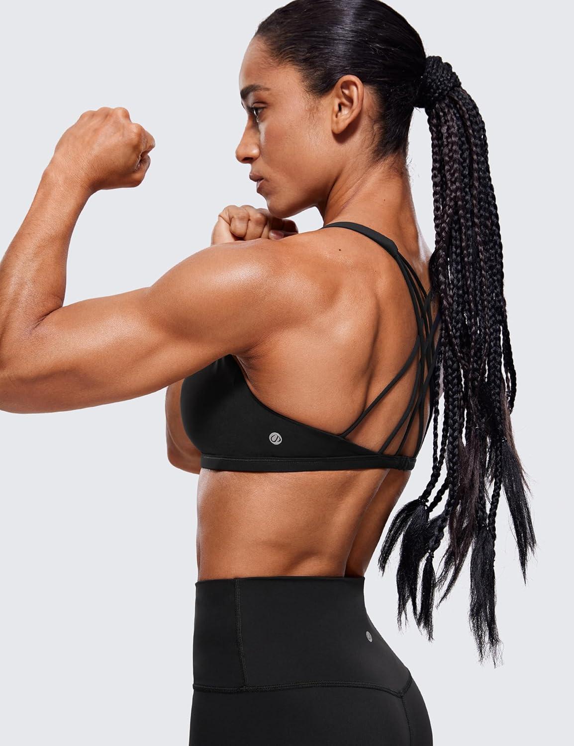 imageCRZ YOGA Womens Naked Feeling Criss Cross Sports Bra Strappy Back Padded Medium Support Wireless Gym Cami Workout YogaBlack