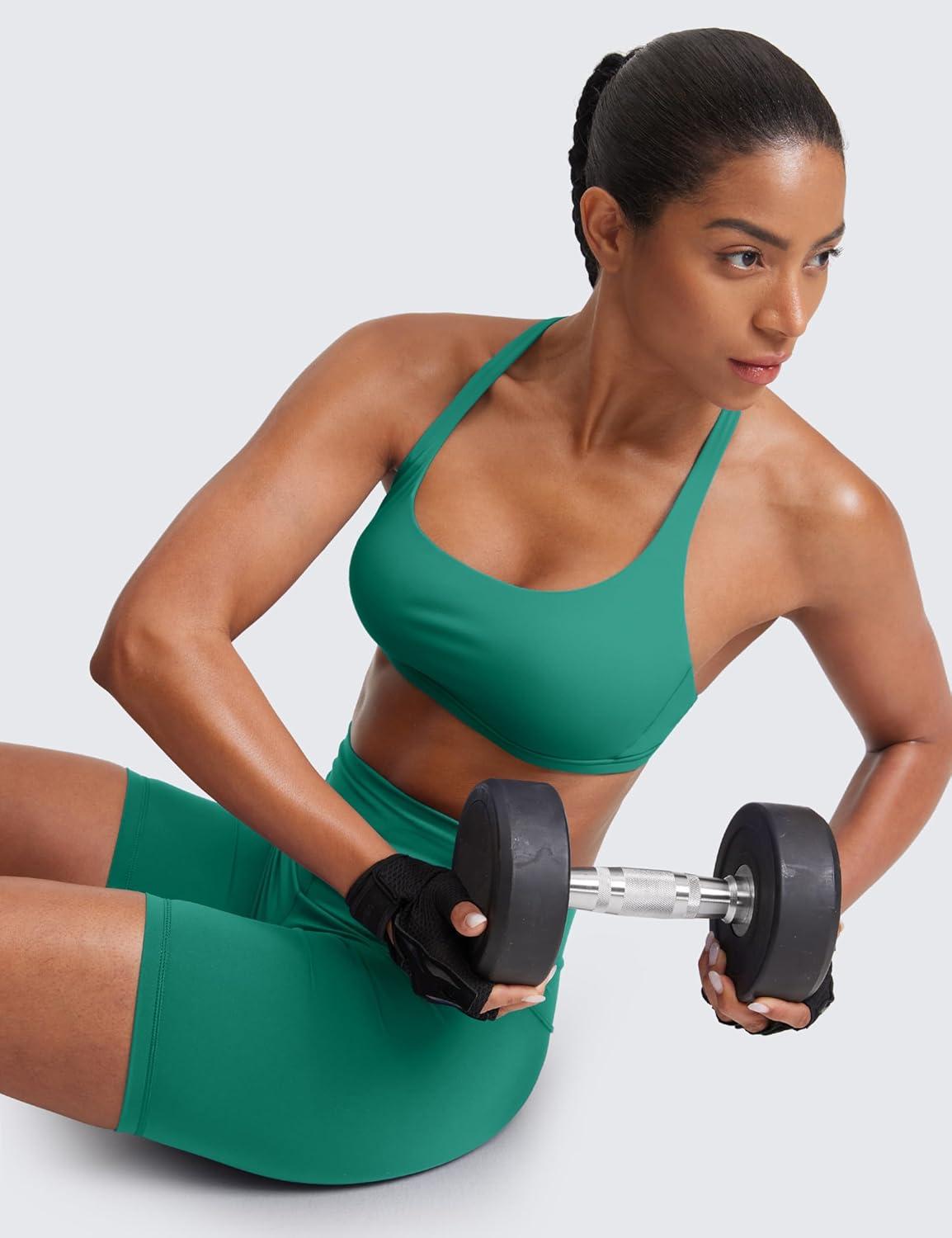 imageCRZ YOGA Womens Naked Feeling Criss Cross Sports Bra Strappy Back Padded Medium Support Wireless Gym Cami Workout YogaCascadia Green