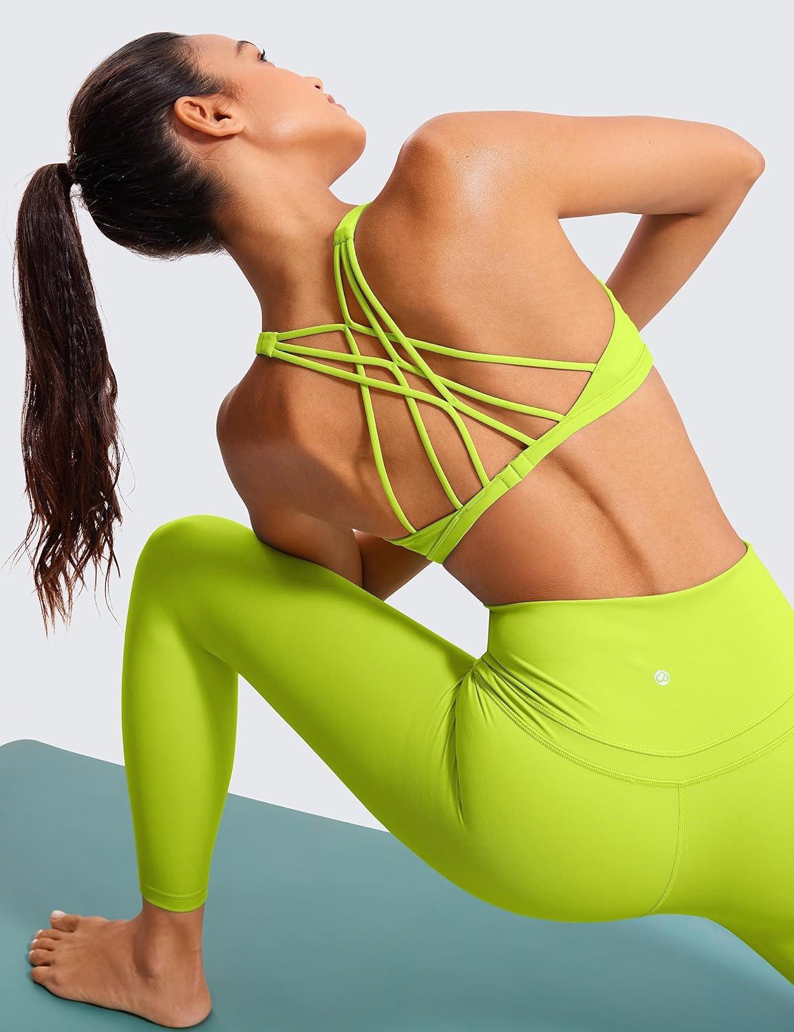 imageCRZ YOGA Womens Naked Feeling Criss Cross Sports Bra Strappy Back Padded Medium Support Wireless Gym Cami Workout YogaChartreuse