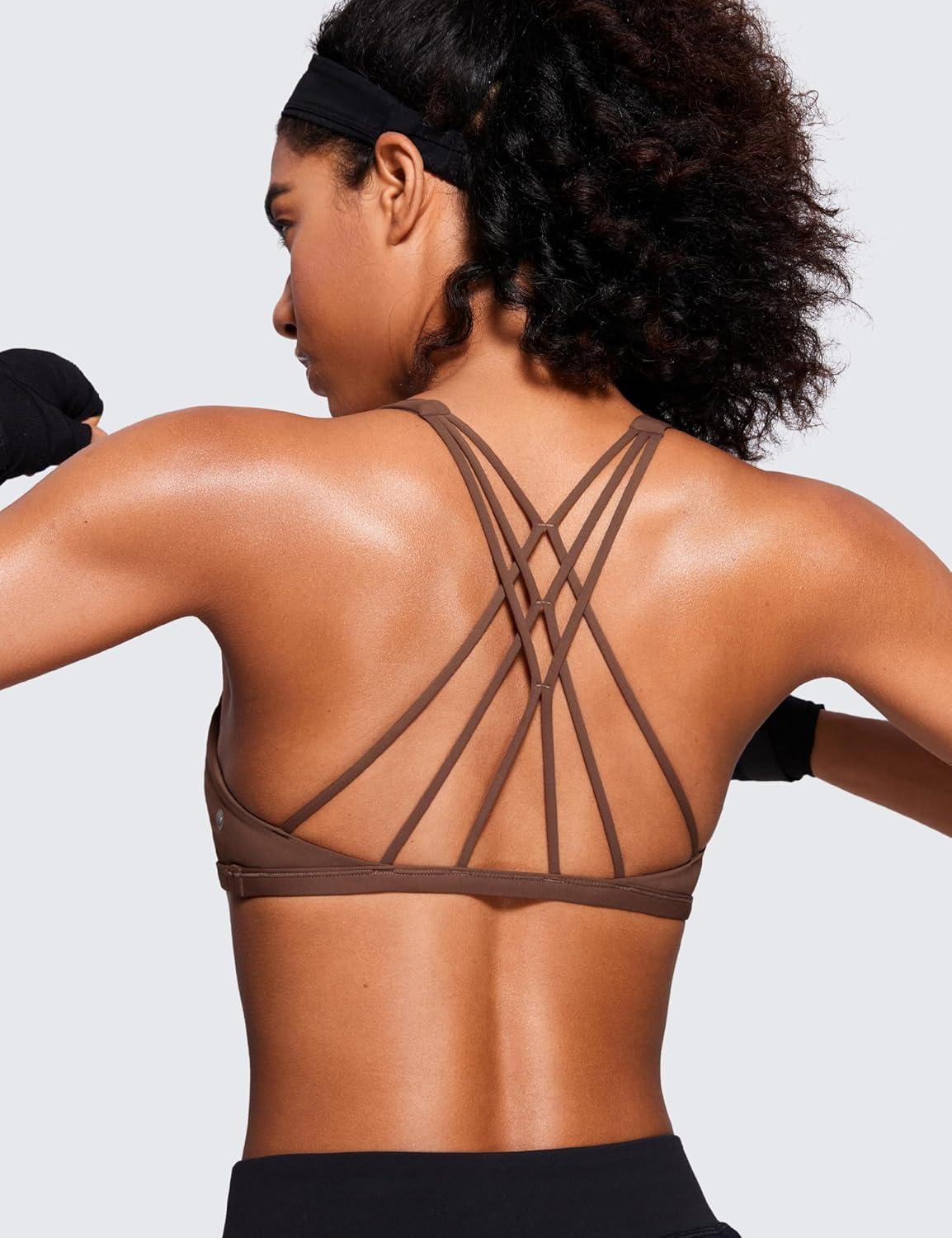 imageCRZ YOGA Womens Naked Feeling Criss Cross Sports Bra Strappy Back Padded Medium Support Wireless Gym Cami Workout YogaCoffee Brown