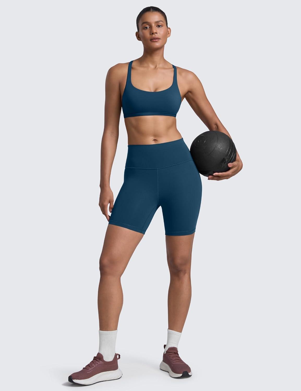 imageCRZ YOGA Womens Naked Feeling Criss Cross Sports Bra Strappy Back Padded Medium Support Wireless Gym Cami Workout YogaFrench Navy