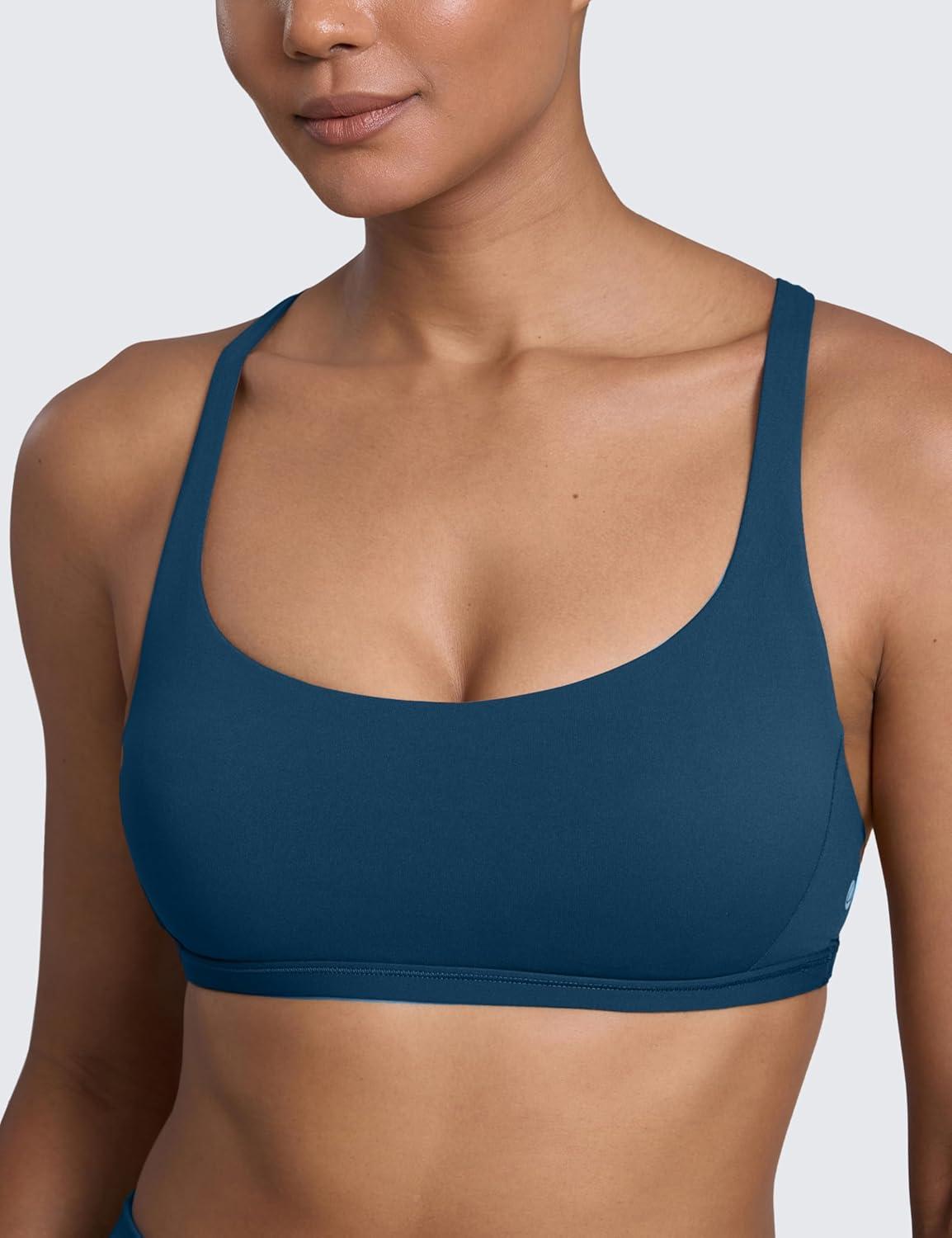 imageCRZ YOGA Womens Naked Feeling Criss Cross Sports Bra Strappy Back Padded Medium Support Wireless Gym Cami Workout YogaFrench Navy