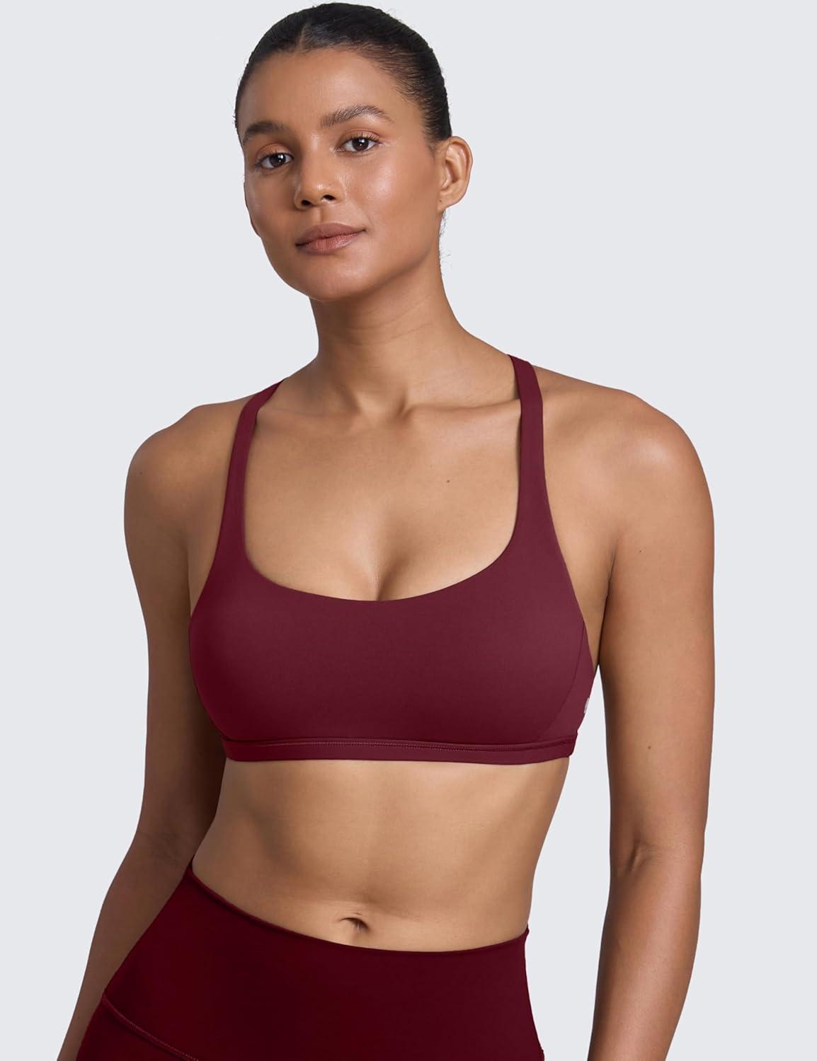 imageCRZ YOGA Womens Naked Feeling Criss Cross Sports Bra Strappy Back Padded Medium Support Wireless Gym Cami Workout YogaRed Merlot