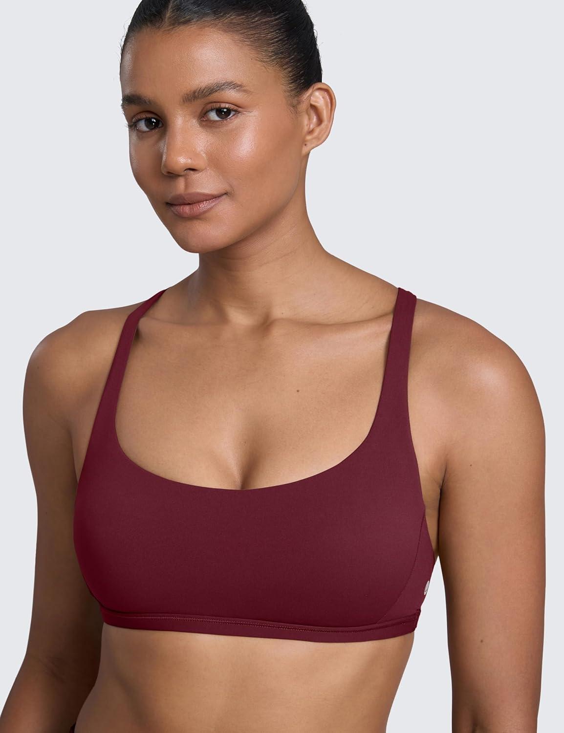 imageCRZ YOGA Womens Naked Feeling Criss Cross Sports Bra Strappy Back Padded Medium Support Wireless Gym Cami Workout YogaRed Merlot