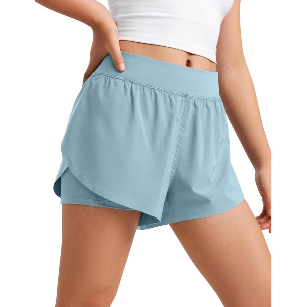 imageCRZ YOGA Girls FeatheryFit Soft 2 in 1 Dolphin Athletic Shorts Tennis Soccer Running Casual Liner Pockets Kids TeenLight Grayish Blue