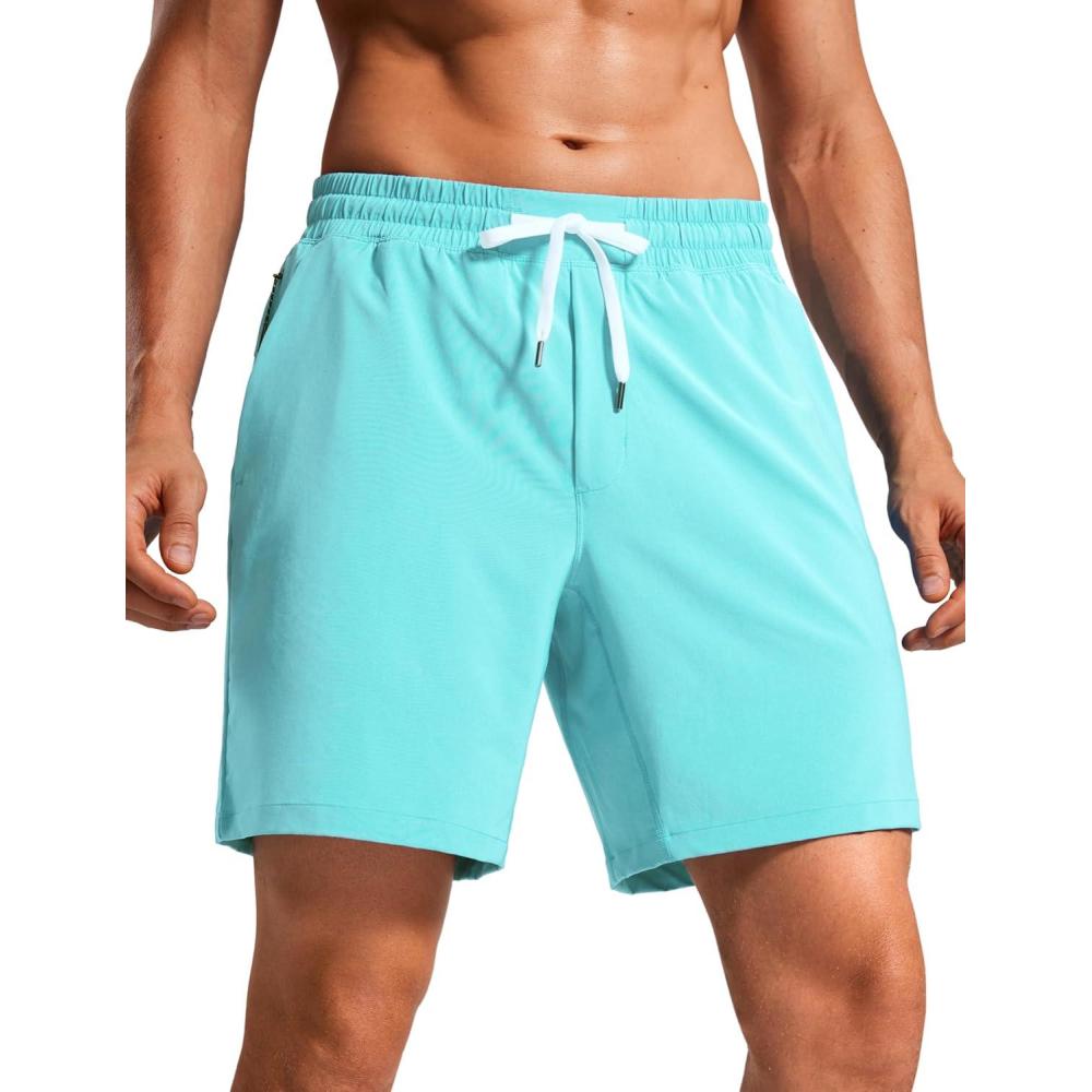 imageCRZ YOGA Mens Swim Trunks 7 Quick Dry Mesh Lining Athletic Casual Swimwear Shorts with Zipper PocketsTurquoise