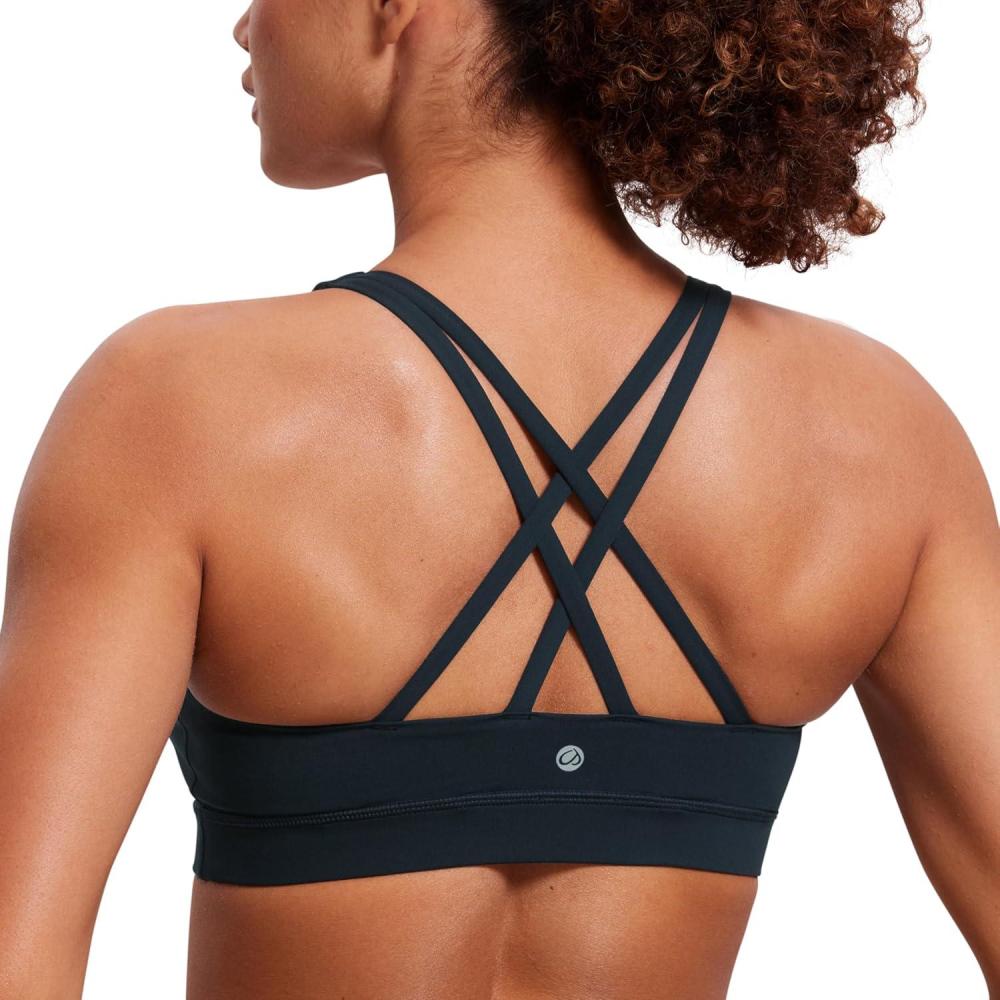 imageCRZ YOGA Naked Feeling Strappy Padded Sports Bras for Women Fitness Workout Top Criss Cross Back Yoga CamiTrue Navy
