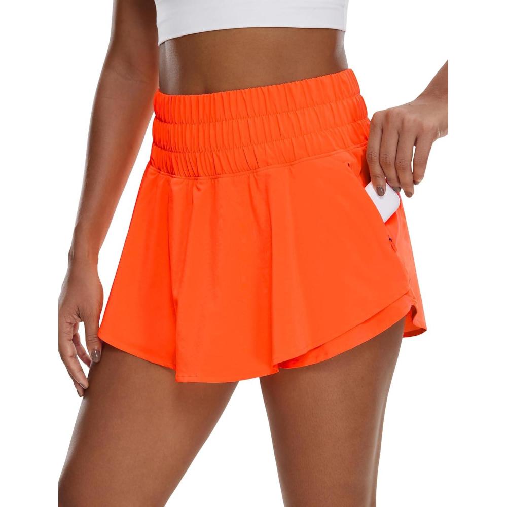 imageCRZ YOGA Ruffle Skirt Overlay Athletic Shorts for Women High Waisted Flowy for Workout Running Tennis with Zip PocketNeon Orange