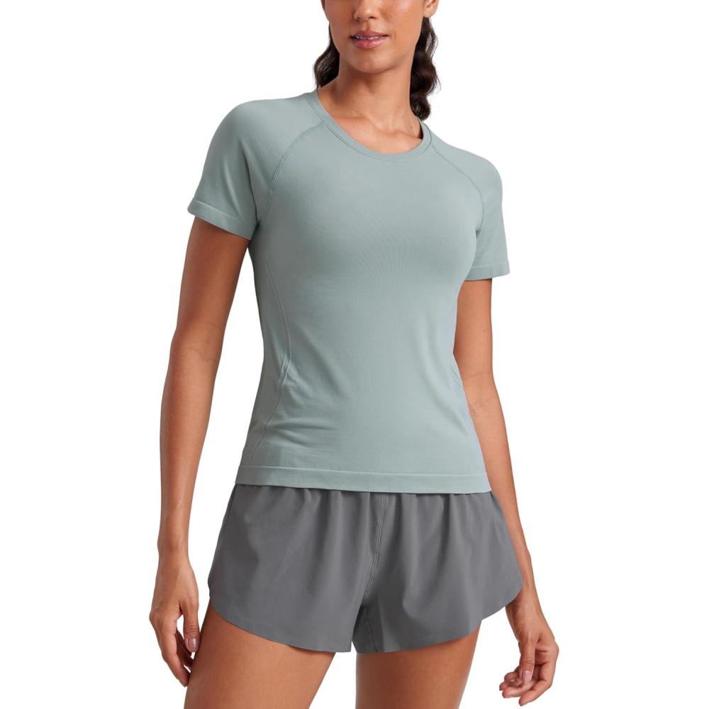 imageCRZ YOGA Seamless Workout Tops for Women Waist Running Gym Athletic Yoga Short Sleeve Shirts Breathable Basic CrewneckGreen Palm Court