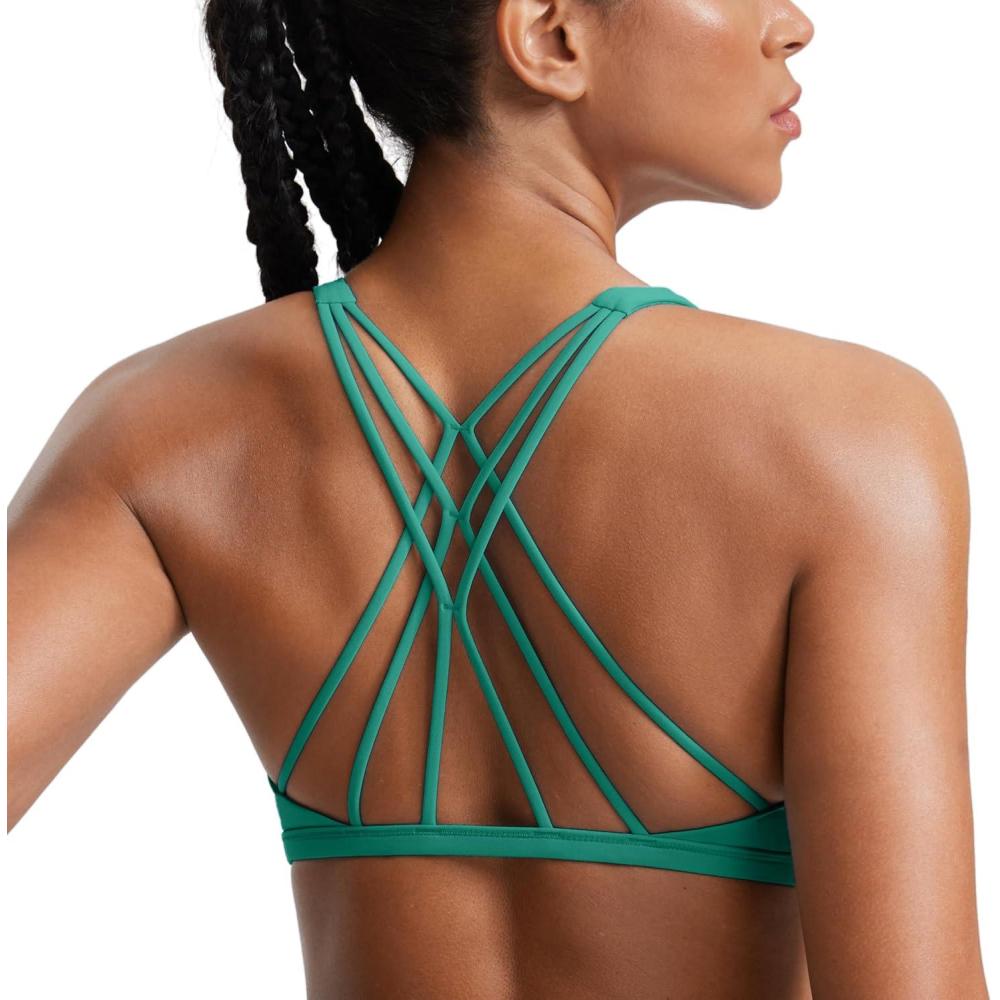 imageCRZ YOGA Womens Naked Feeling Criss Cross Sports Bra Strappy Back Padded Medium Support Wireless Gym Cami Workout YogaCascadia Green