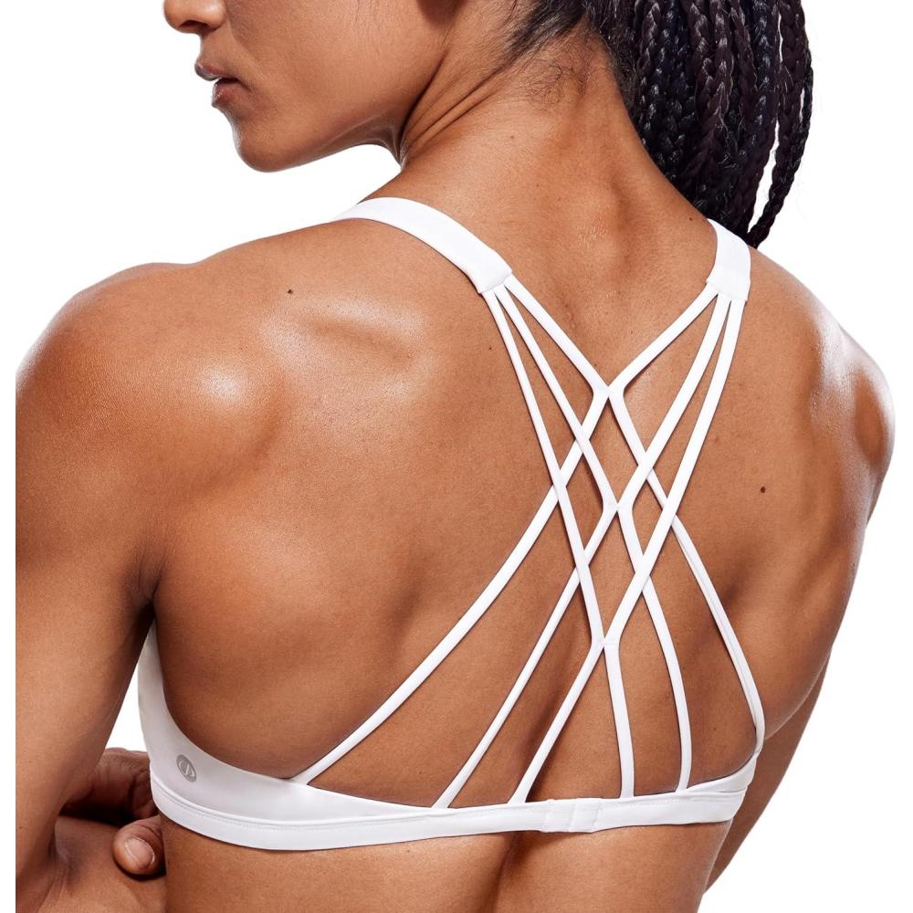 imageCRZ YOGA Womens Naked Feeling Criss Cross Sports Bra Strappy Back Padded Medium Support Wireless Gym Cami Workout YogaWhite