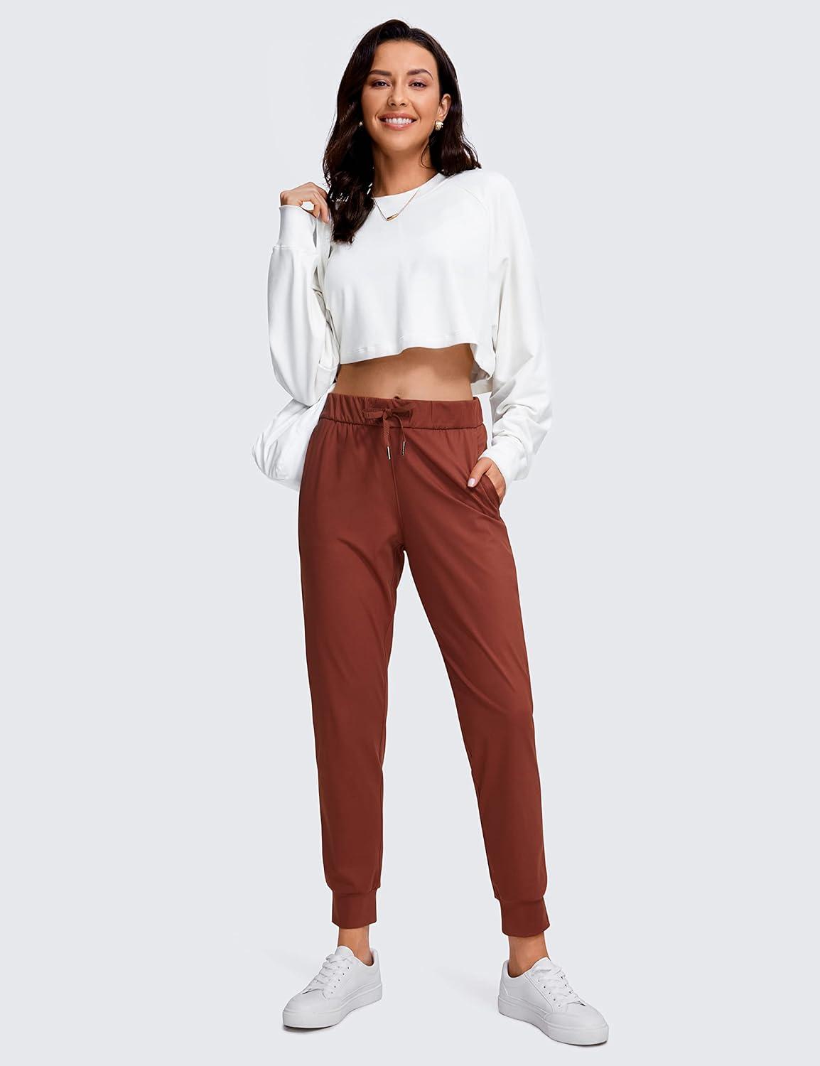 imageCRZ YOGA 4Way Stretch Workout Joggers for Women 28quot Casual Travel Athletic Pants with PocketsThe Cognac Brown