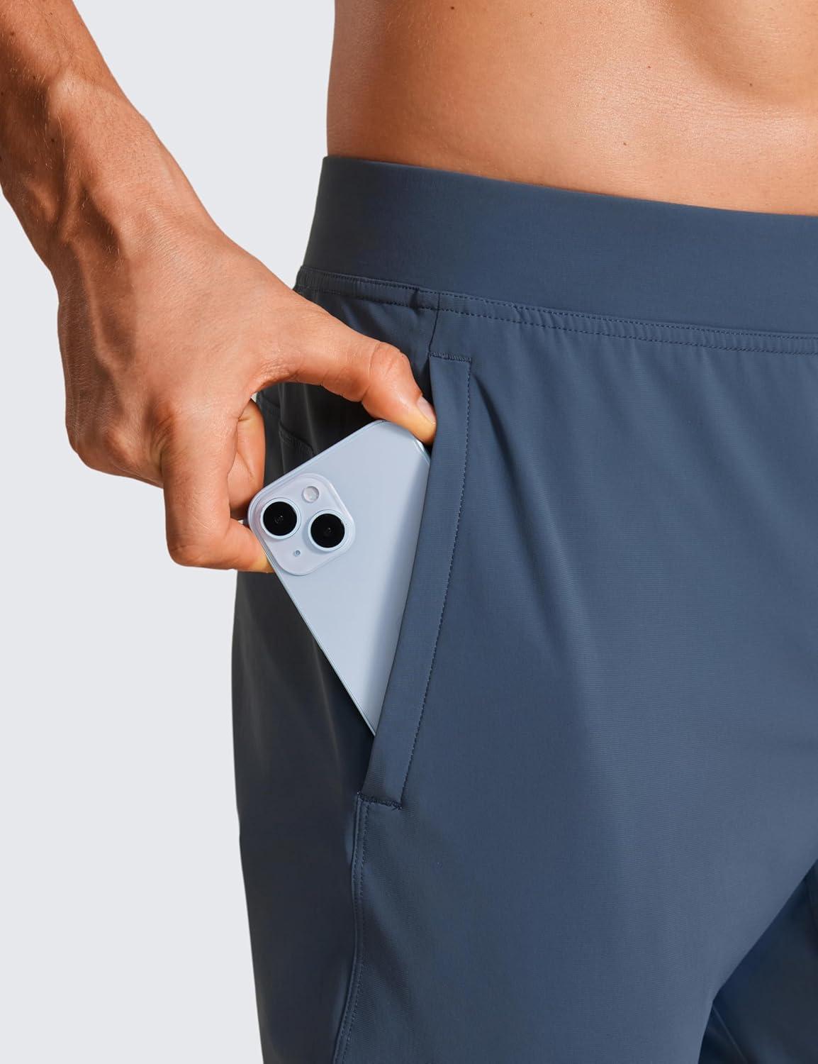 imageCRZ YOGA Athletic Joggers for Men 29quot Lightweight Running Training Pants with Zip Pockets and Ankle ZippersElectric Blue