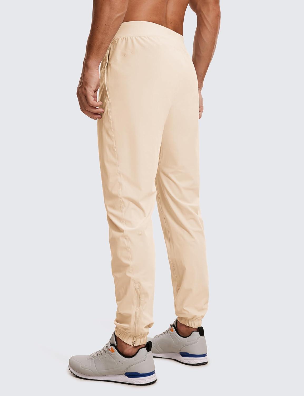 imageCRZ YOGA Athletic Joggers for Men 29quot Lightweight Running Training Pants with Zip Pockets and Ankle ZippersRaw Linen