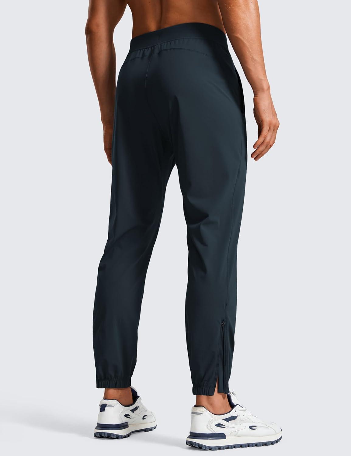 imageCRZ YOGA Athletic Joggers for Men 29quot Lightweight Running Training Pants with Zip Pockets and Ankle ZippersTrue Navy