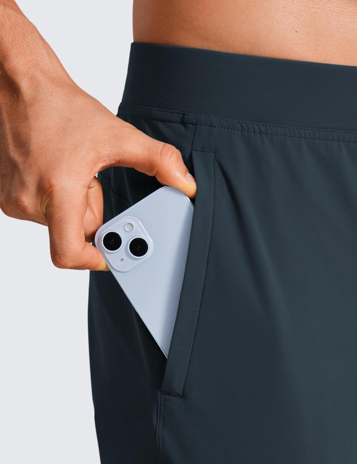 imageCRZ YOGA Athletic Joggers for Men 29quot Lightweight Running Training Pants with Zip Pockets and Ankle ZippersTrue Navy