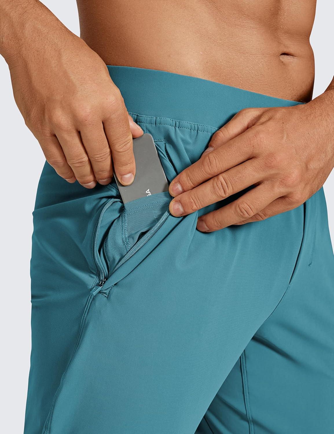 imageCRZ YOGA Athletic Joggers for Men 29quot Lightweight Running Training Pants with Zip Pockets and Ankle ZippersWashed Blue