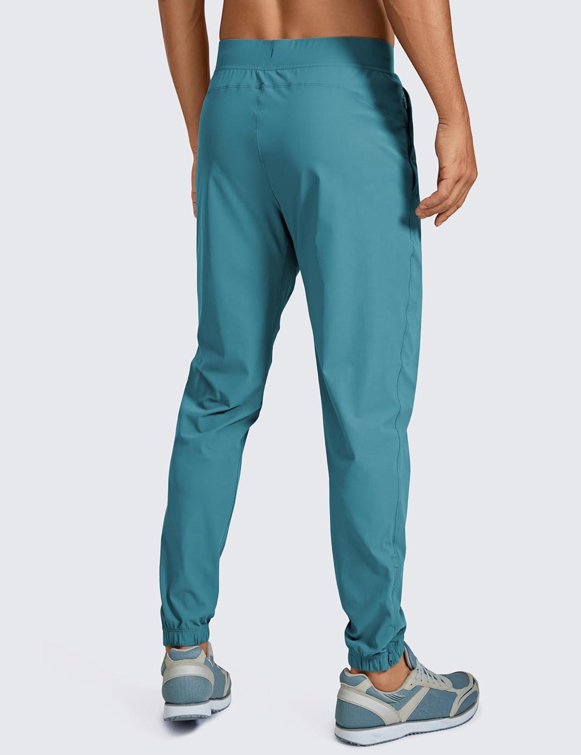 imageCRZ YOGA Athletic Joggers for Men 29quot Lightweight Running Training Pants with Zip Pockets and Ankle ZippersWashed Blue