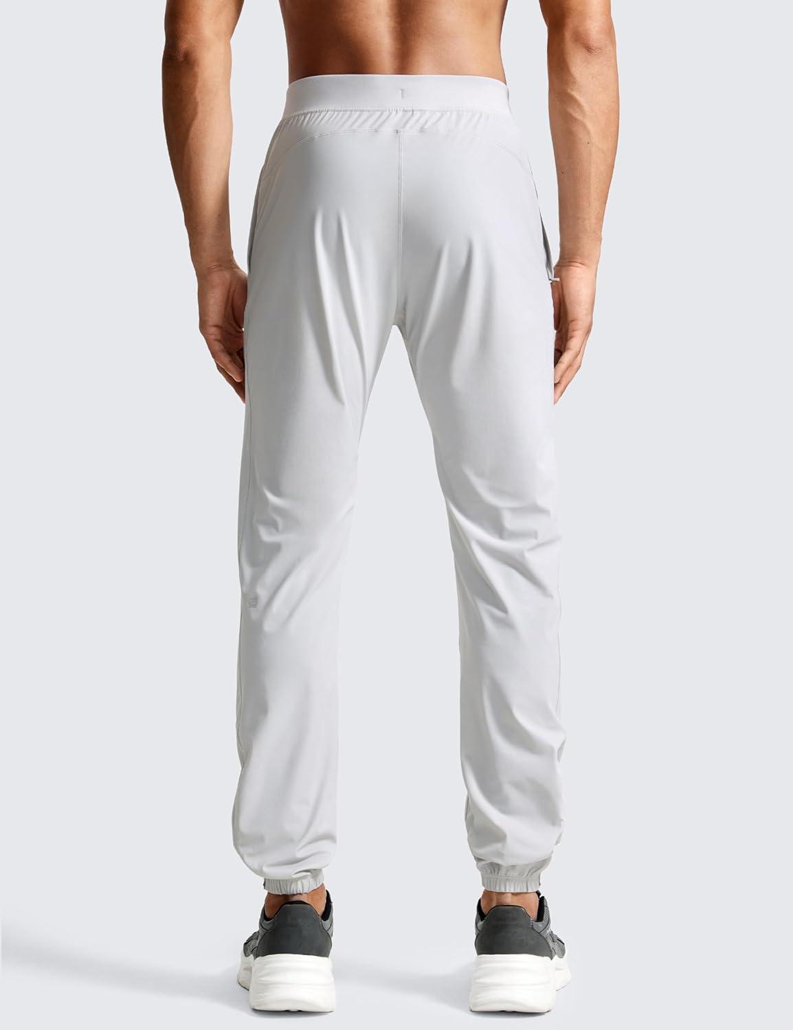 imageCRZ YOGA Athletic Joggers for Men 31quot Lightweight Running Training Pants with Zip Pockets and Ankle ZippersPlatinum Grey