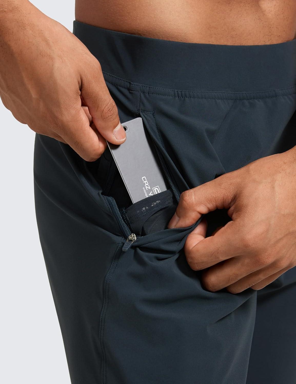 imageCRZ YOGA Athletic Joggers for Men 31quot Lightweight Running Training Pants with Zip Pockets and Ankle ZippersTrue Navy