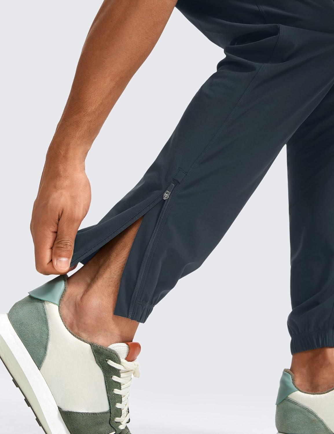 imageCRZ YOGA Athletic Joggers for Men 31quot Lightweight Running Training Pants with Zip Pockets and Ankle ZippersTrue Navy