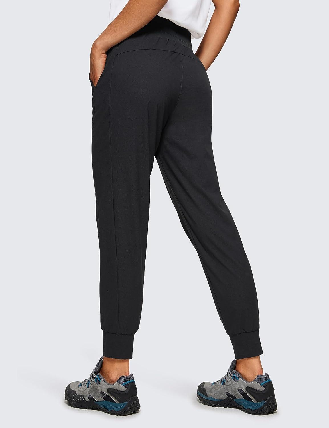 imageCRZ YOGA Athletic Joggers for Women 275quot Lightweight Travel Outdoor Hiking Pants with PocketsBlack