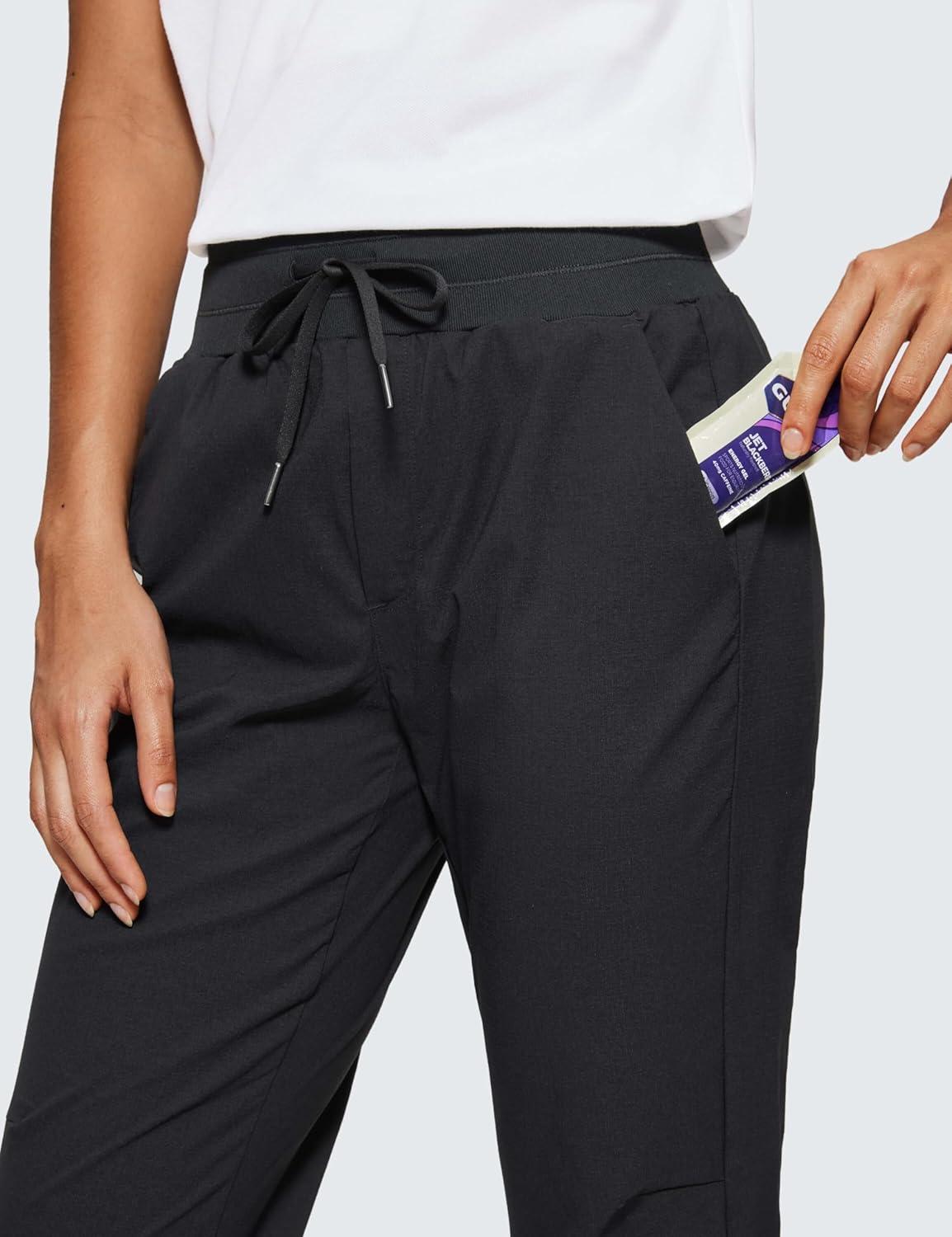 imageCRZ YOGA Athletic Joggers for Women 275quot Lightweight Travel Outdoor Hiking Pants with PocketsBlack