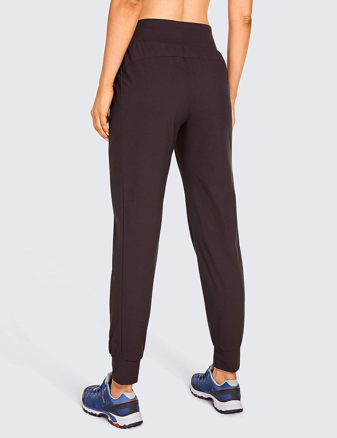 imageCRZ YOGA Athletic Joggers for Women 275quot Lightweight Travel Outdoor Hiking Pants with PocketsChestnut Purple