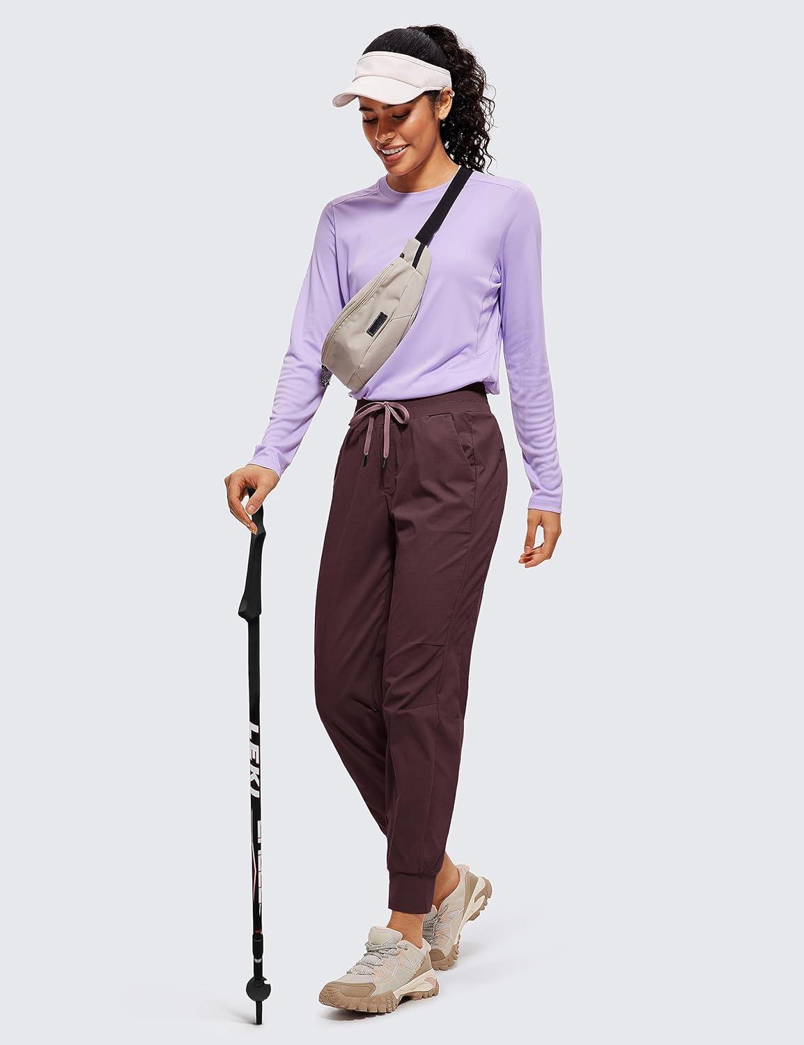 imageCRZ YOGA Athletic Joggers for Women 275quot Lightweight Travel Outdoor Hiking Pants with PocketsDark Russet