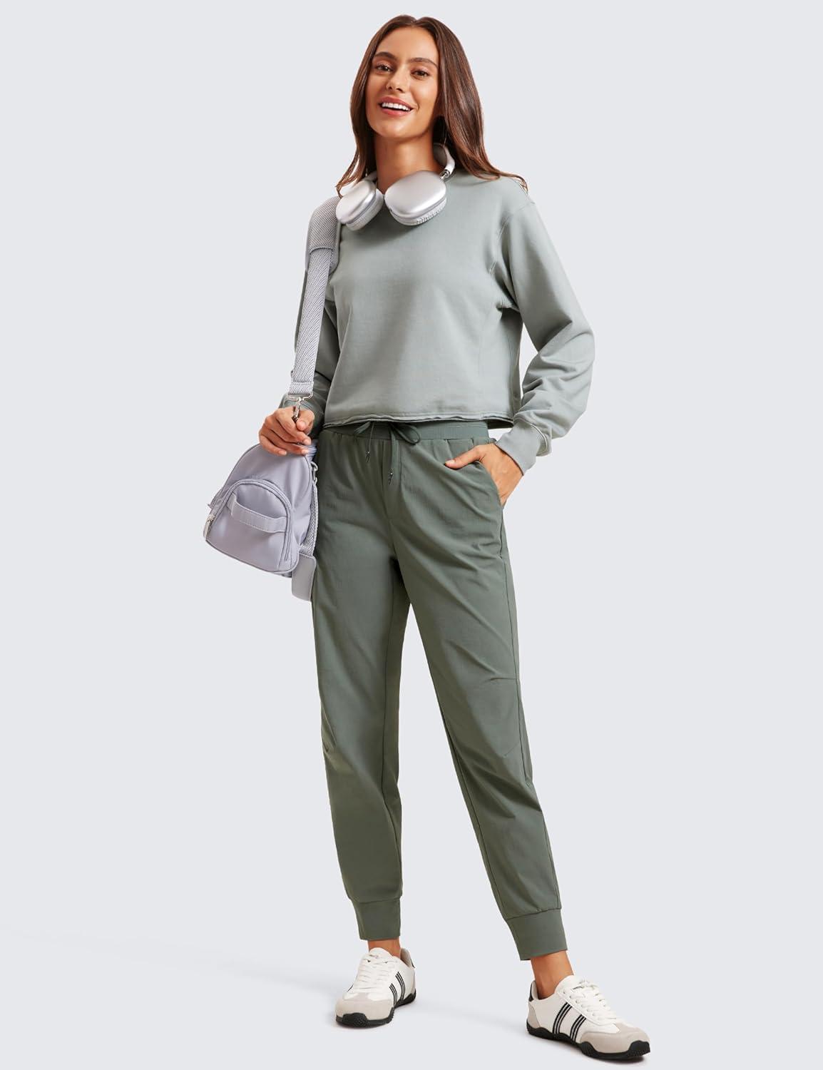 imageCRZ YOGA Athletic Joggers for Women 275quot Lightweight Travel Outdoor Hiking Pants with PocketsGrey Sage