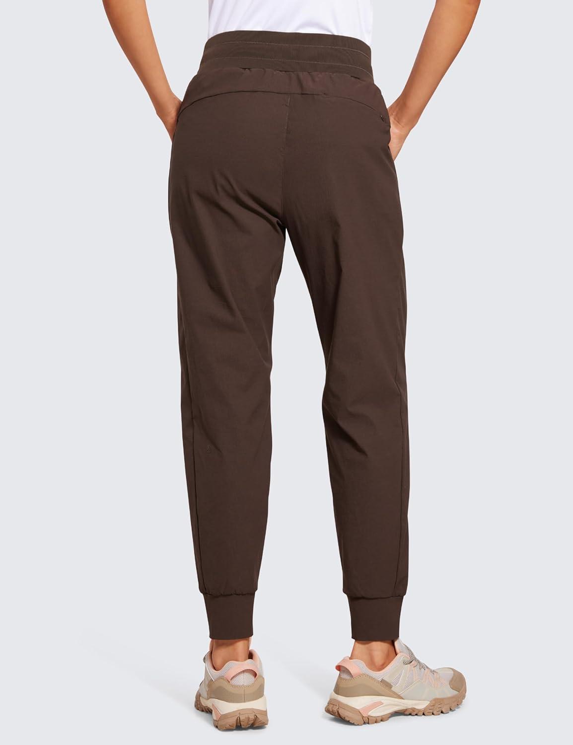 imageCRZ YOGA Athletic Joggers for Women 275quot Lightweight Travel Outdoor Hiking Pants with PocketsHot Fudge Brown