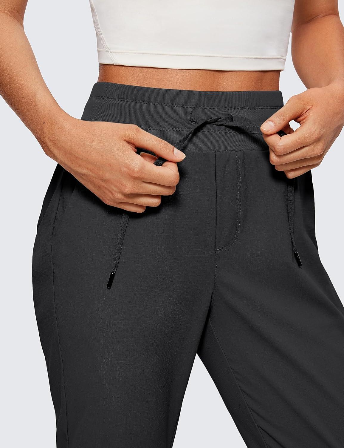 imageCRZ YOGA Athletic Joggers for Women 275quot Lightweight Travel Outdoor Hiking Pants with PocketsInk Gray