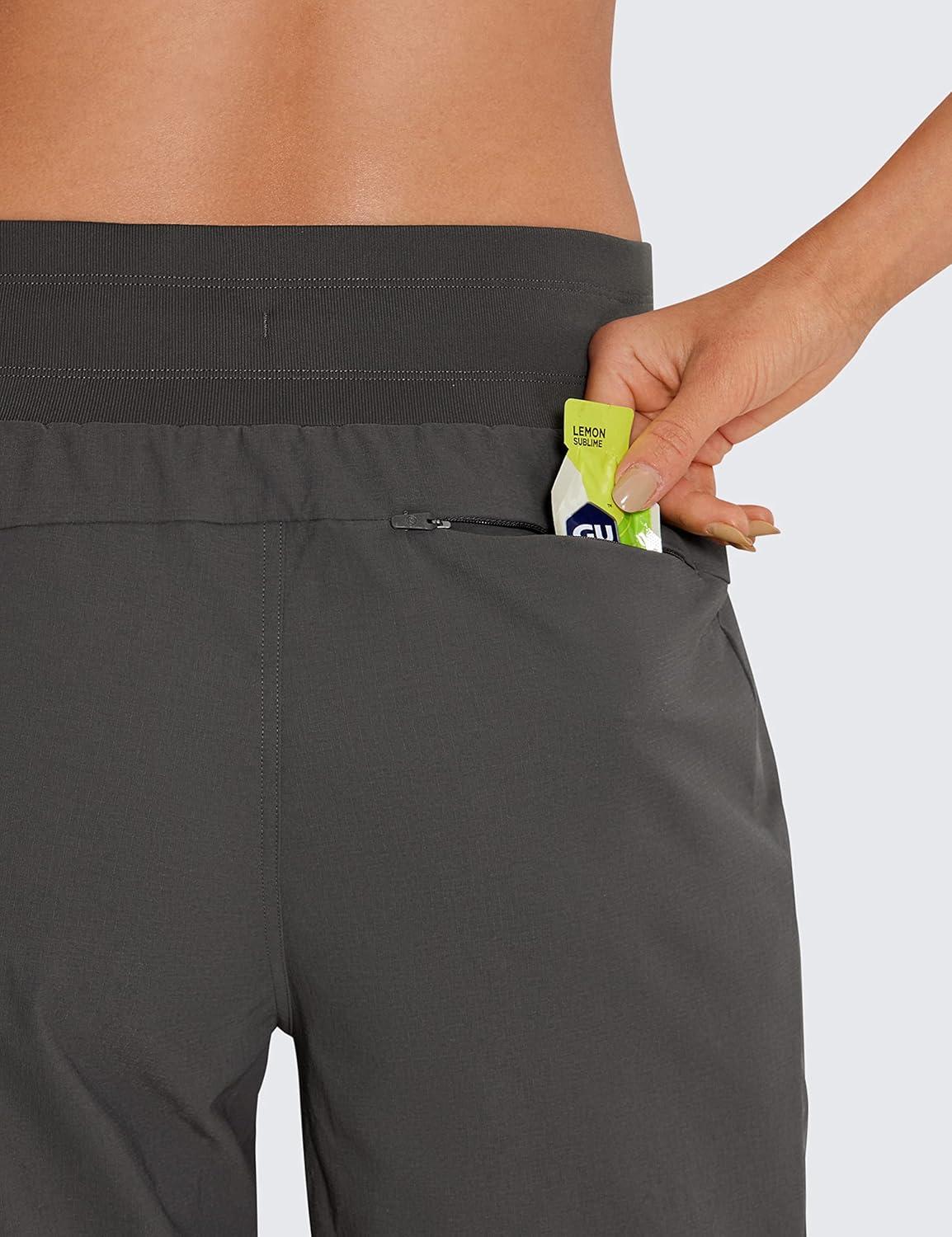 imageCRZ YOGA Athletic Joggers for Women 275quot Lightweight Travel Outdoor Hiking Pants with PocketsMountain Green